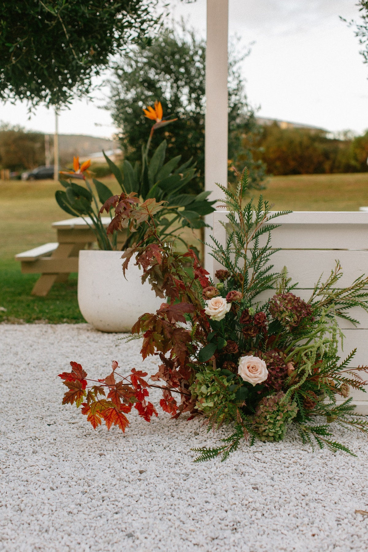 Floral pillar moved from a home ceremony to the entrance of Dunes Palm Beach for the reception